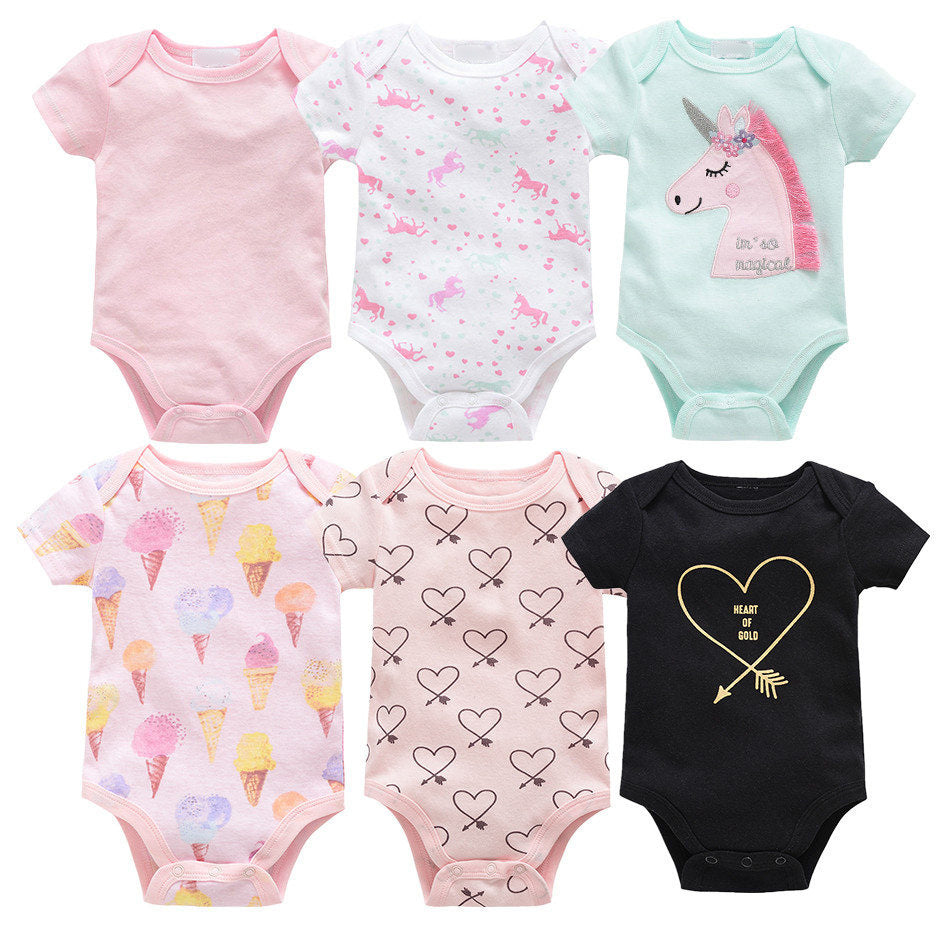 Six sets of newborn clothes