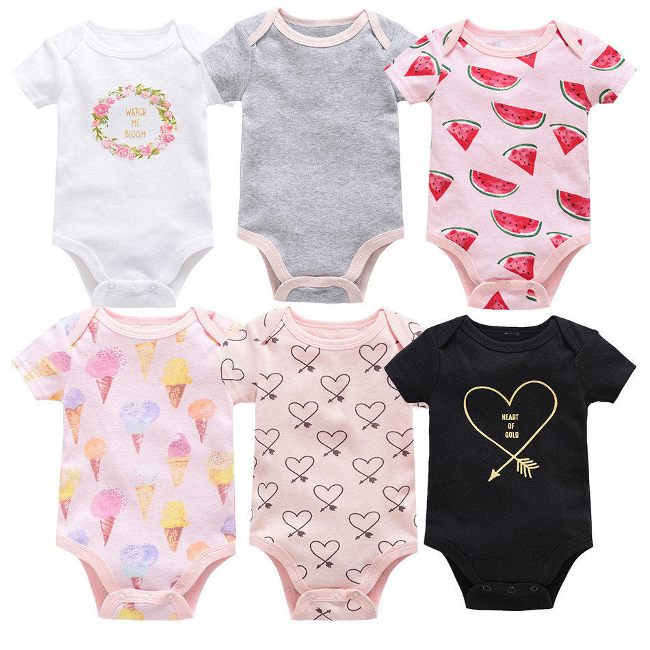 Six sets of newborn clothes